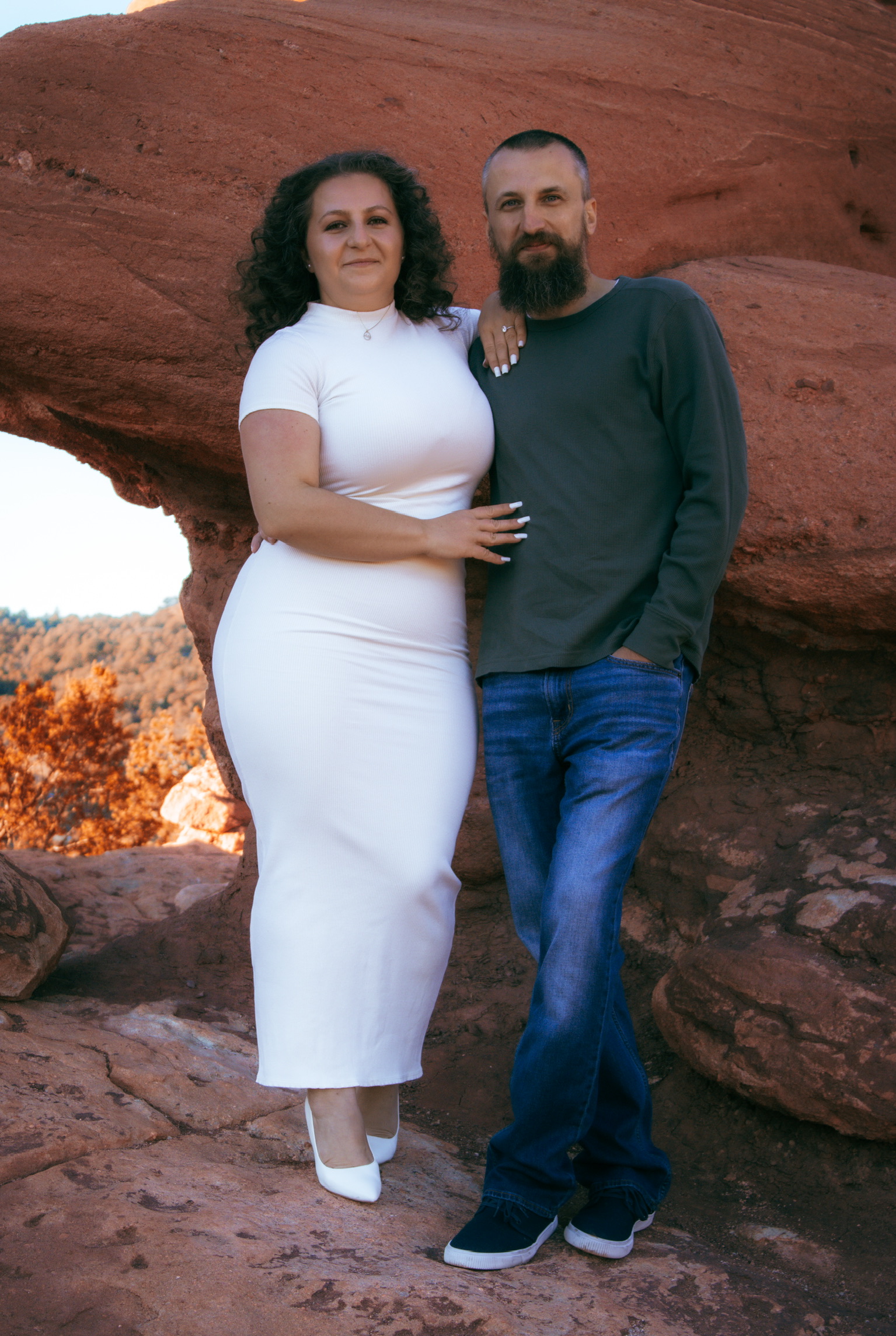 Adam and Emirjeta in their engagement attire at Garden of the Gods