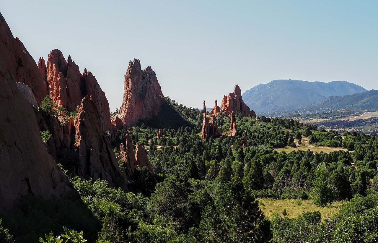 Garden of the Gods red rock formations with Pikes Peak in the distance